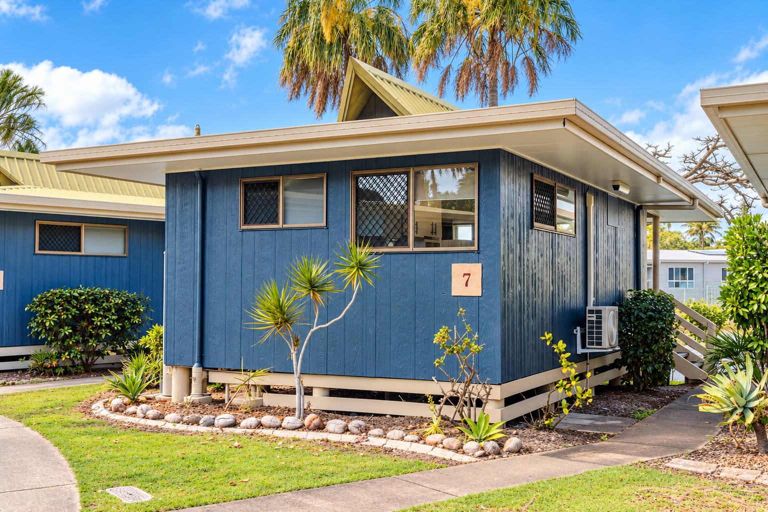 Sanctuary Lakeside Studio 7 — studio exterior in tropical garden setting